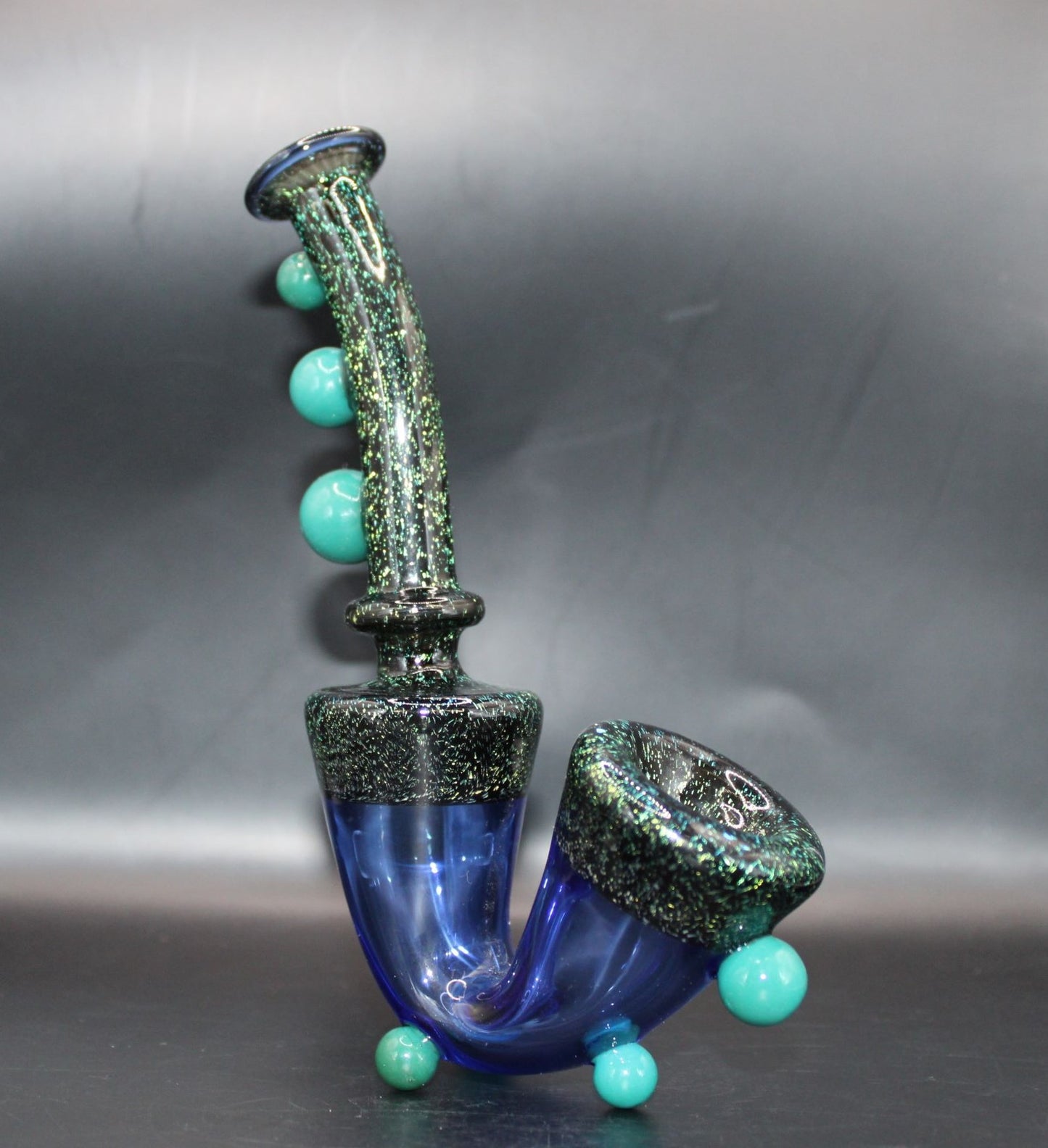 TURQUOISE DICHROIC STANDING SAXOPHONE