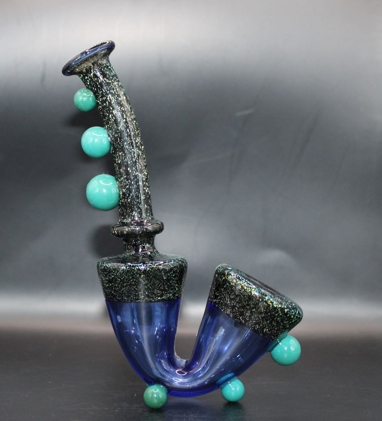 TURQUOISE DICHROIC STANDING SAXOPHONE