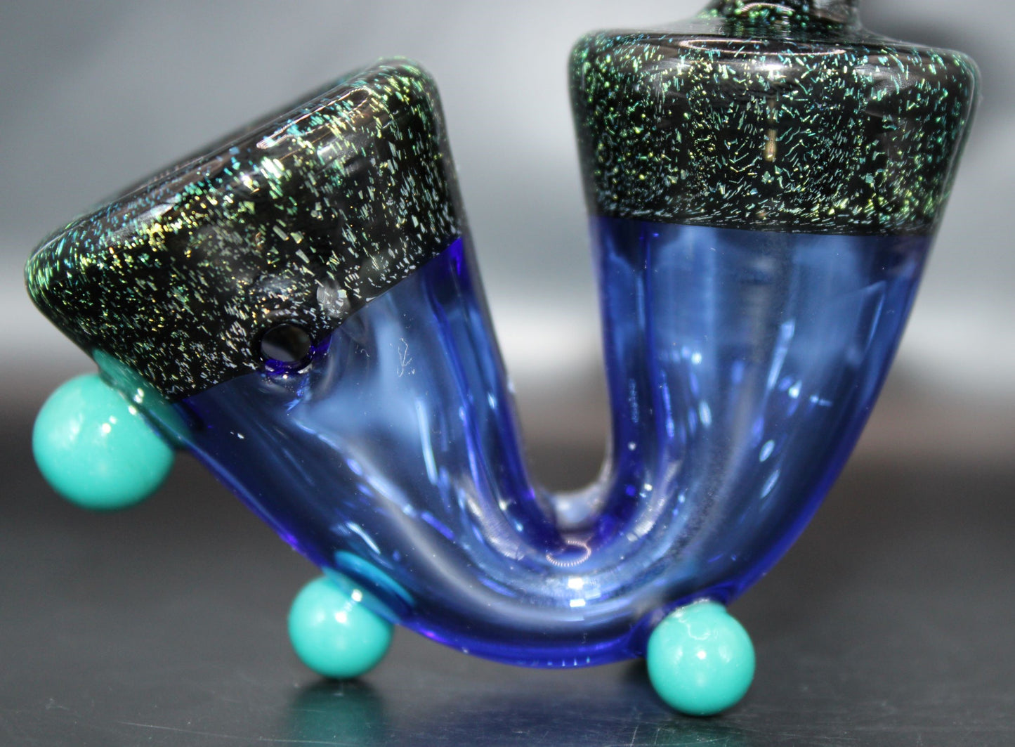 TURQUOISE DICHROIC STANDING SAXOPHONE