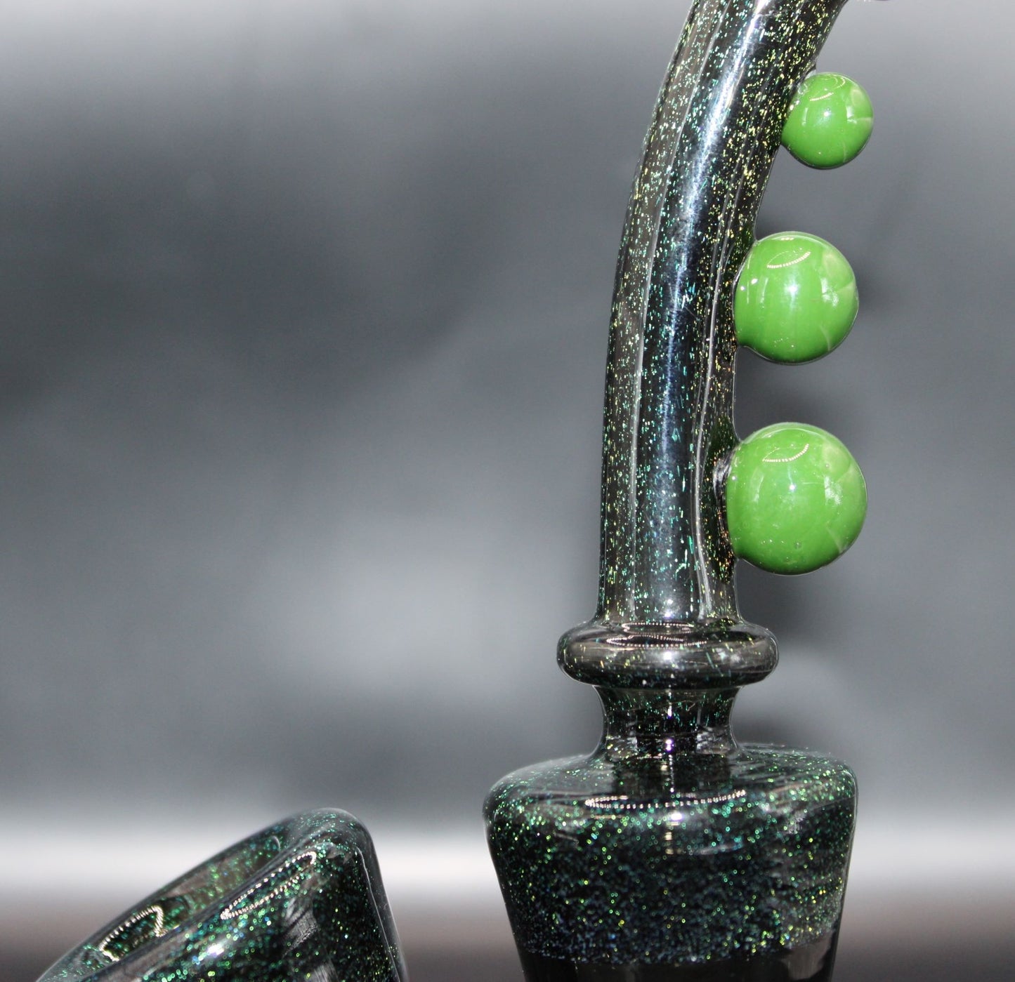 FOREST GREEN DICHROIC STANDING SAXOPHONE