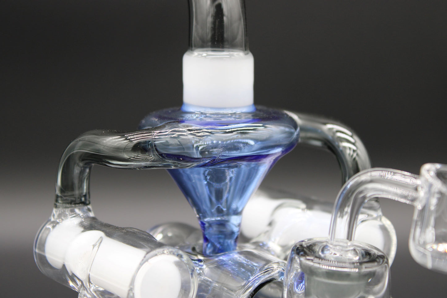 CLEAR, WHITE, COBALT, AND SMOKE-CYCLONE RECYCLER